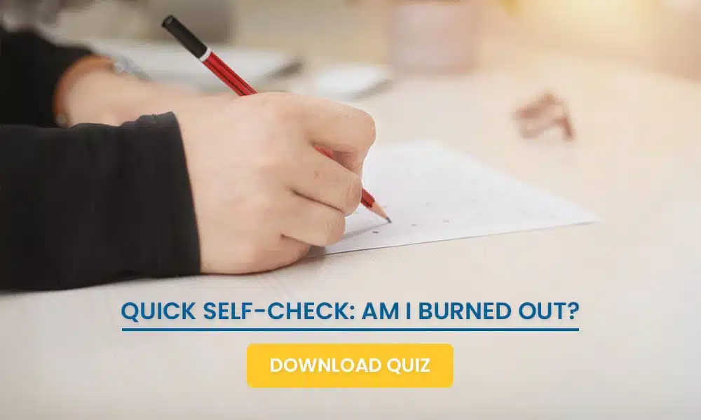 Person filling out a burnout self check quiz with a red pen at a desk, promoting mental health awareness and self assessment.